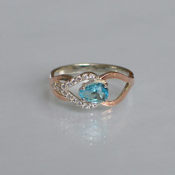 Срібна каблучка з золотими вставками