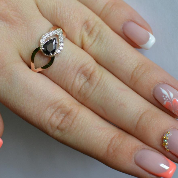 Срібна каблучка з золотими вставками