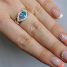 Срібна каблучка з золотими вставками