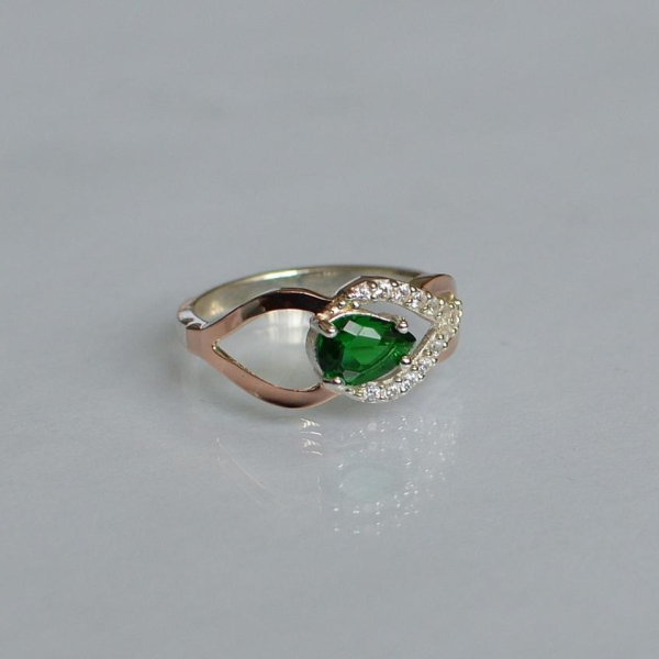 Срібна каблучка з золотими вставками