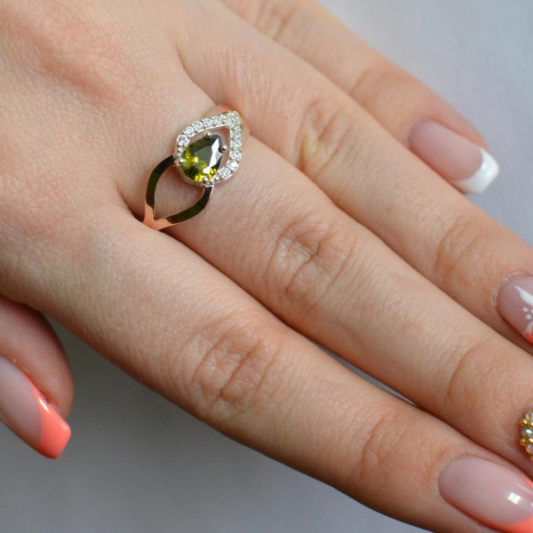 Срібна каблучка з золотими вставками