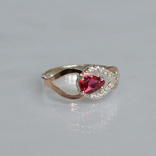 Срібна каблучка з золотими вставками