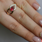 Срібна каблучка з золотими вставками