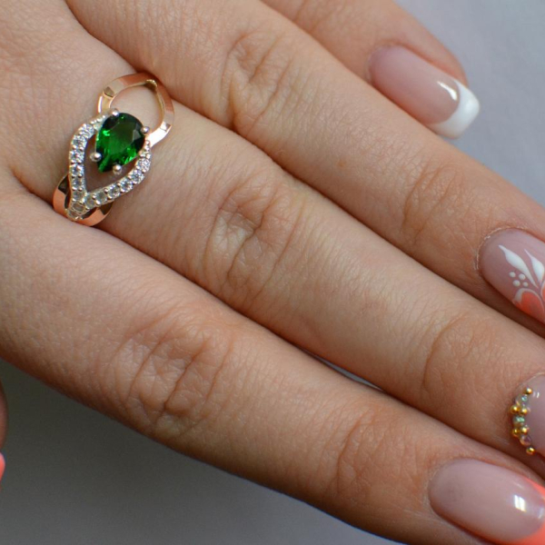 Срібна каблучка з золотими вставками