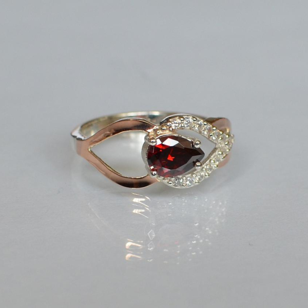 Срібна каблучка з золотими вставками