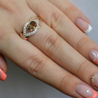 Срібна каблучка з золотими вставками