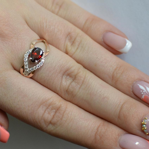 Срібна каблучка з золотими вставками