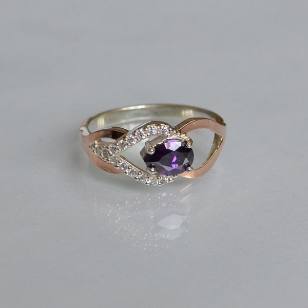 Срібна каблучка з золотими вставками