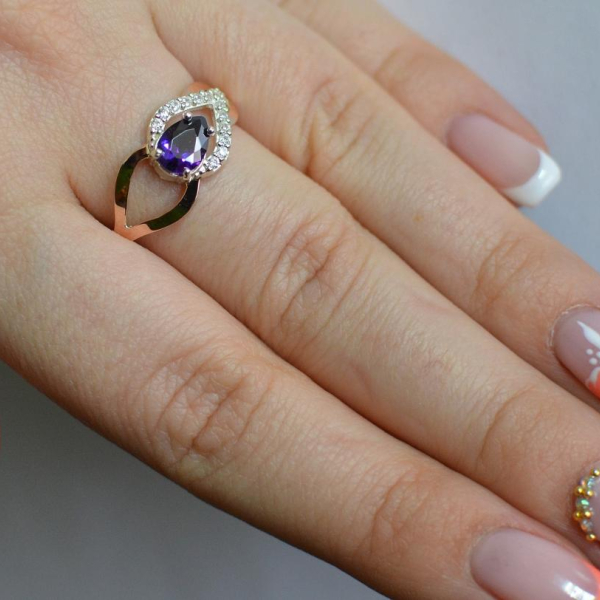 Срібна каблучка з золотими вставками