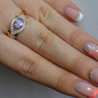 Срібна каблучка з золотими вставками