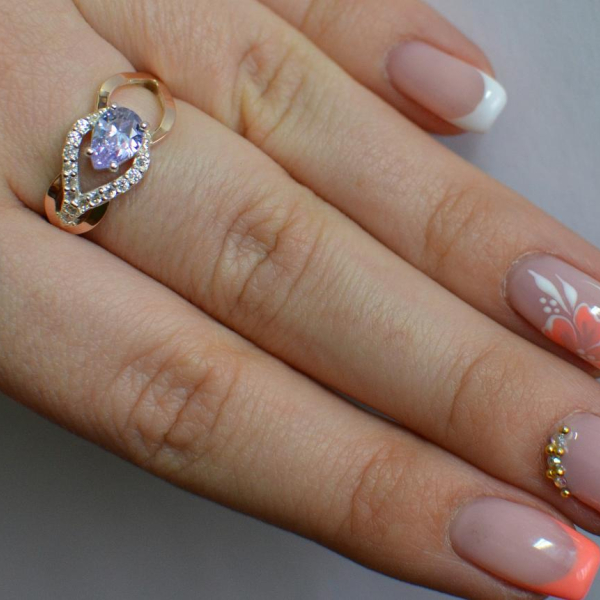 Срібна каблучка з золотими вставками