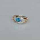 Срібна каблучка з золотими вставками