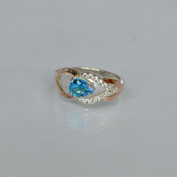 Срібна каблучка з золотими вставками