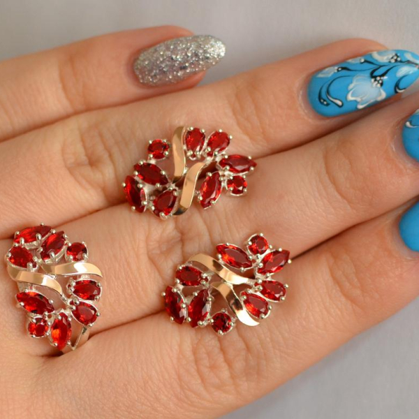 Срібний набір з золотими пластинами