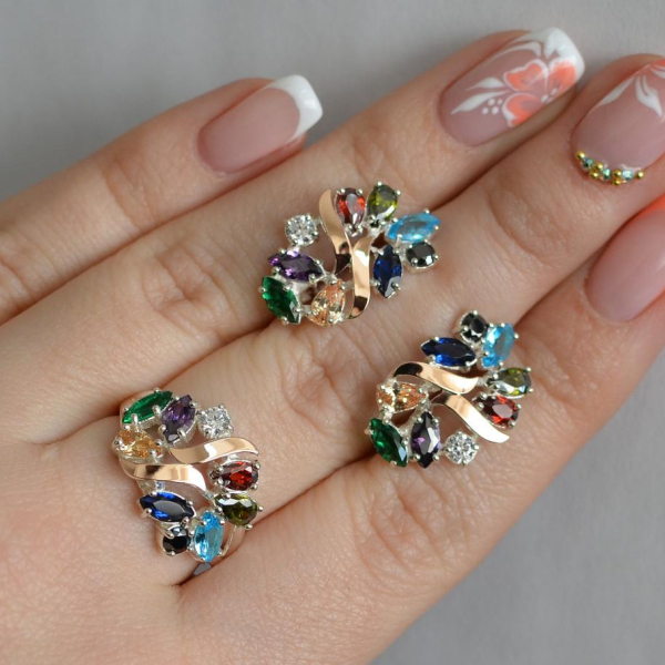 Срібний набір з золотими пластинами