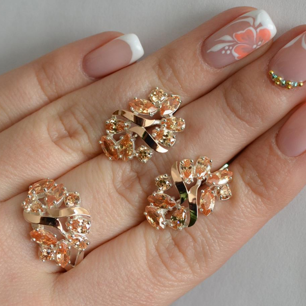 Срібний набір з золотими пластинами