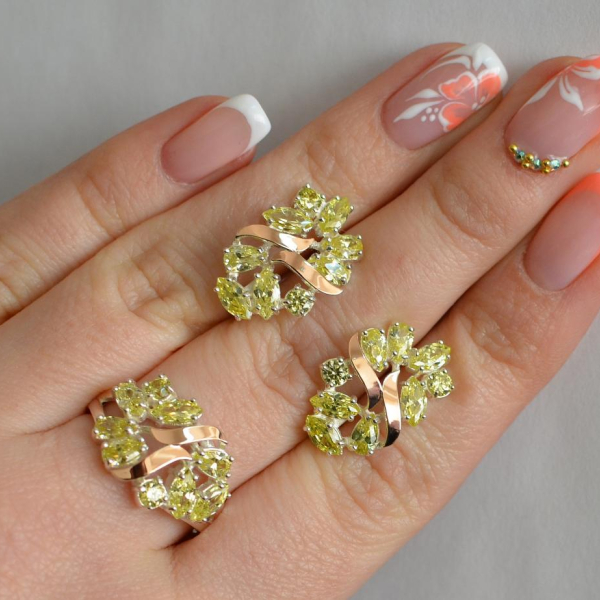 Срібний набір з золотими пластинами