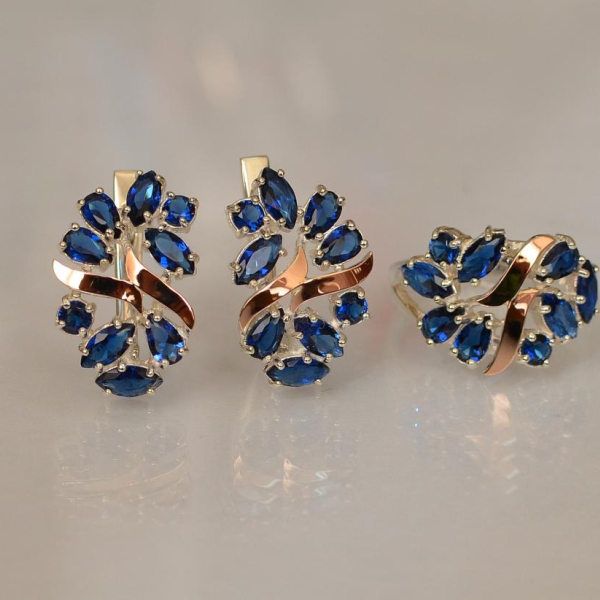 Срібний набір з золотими пластинами