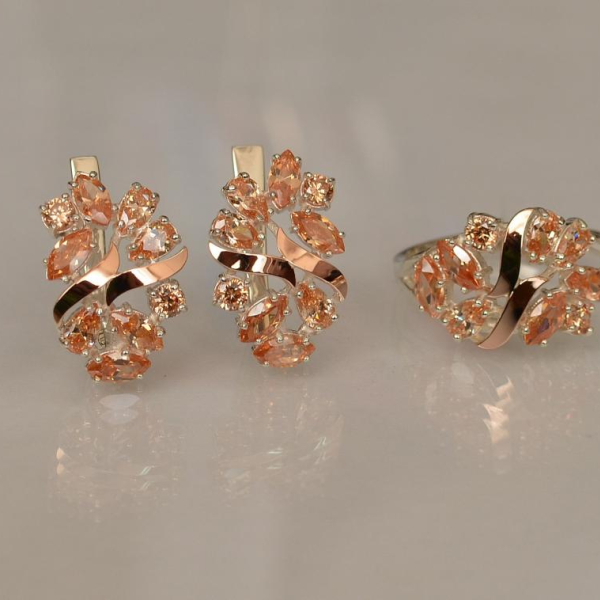 Срібний набір з золотими пластинами