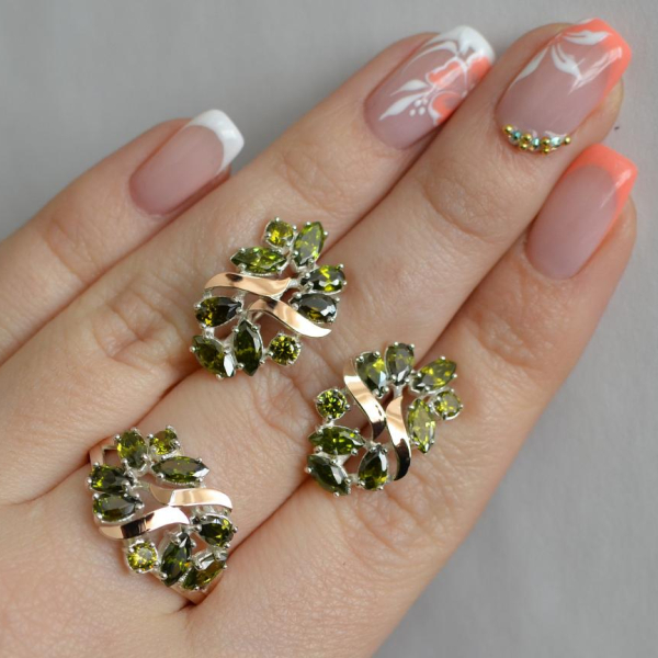 Срібний набір з золотими пластинами