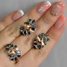 Срібний набір з золотими пластинами