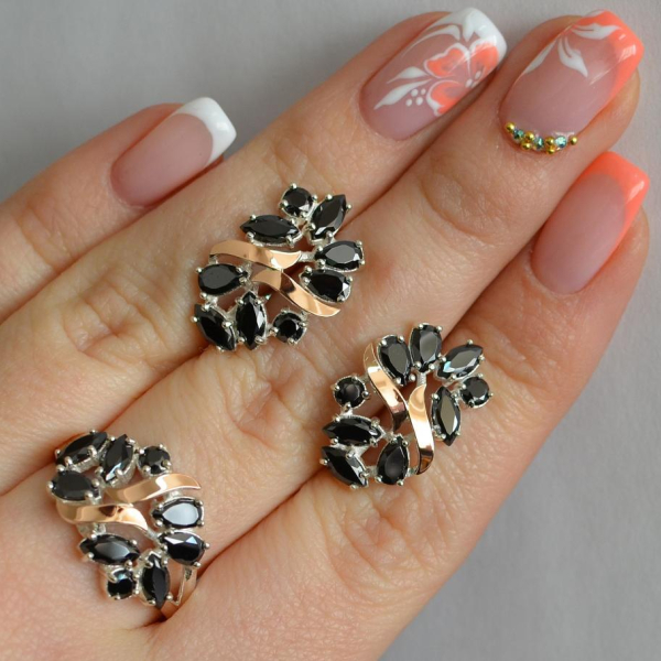 Срібний набір з золотими пластинами