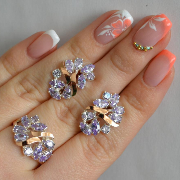 Срібний набір з золотими пластинами