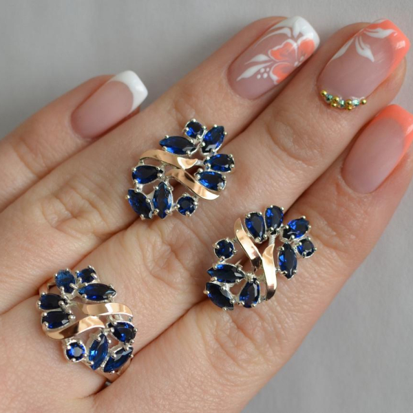 Срібний набір з золотими пластинами