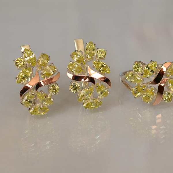 Срібний набір з золотими пластинами