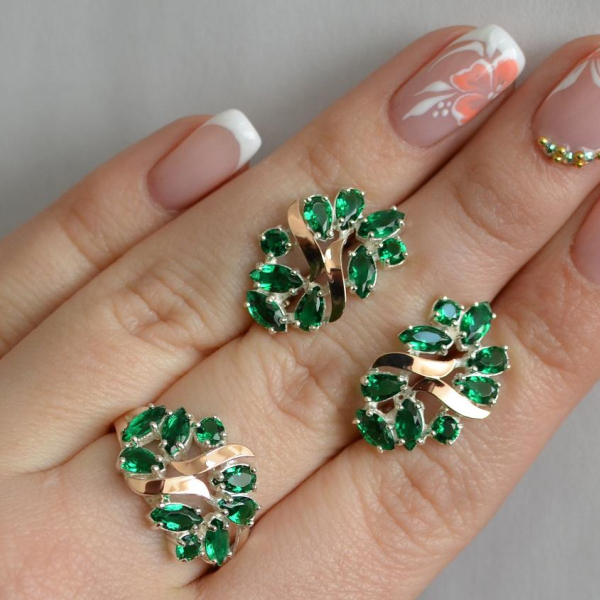 Срібний набір з золотими пластинами