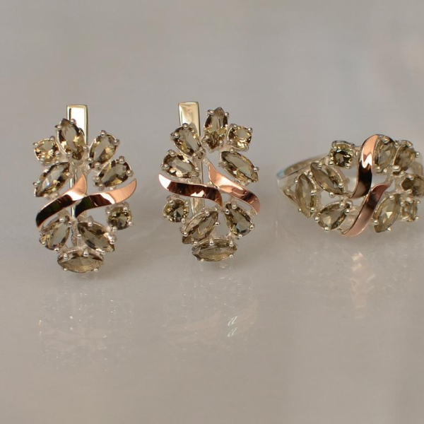 Срібний набір з золотими пластинами