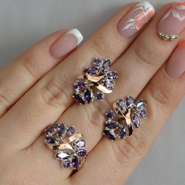 Срібний набір з золотими пластинами