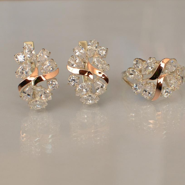 Срібний набір з золотими пластинами