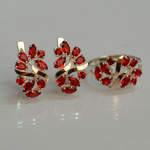 Срібний набір з золотими пластинами