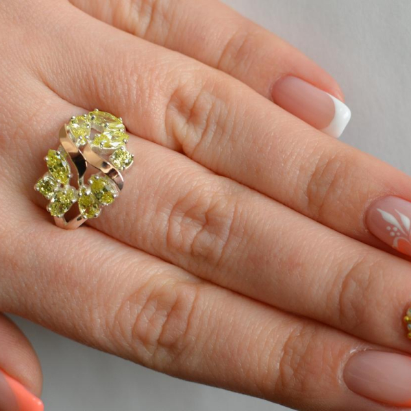 Срібна каблучка з золотими вставками