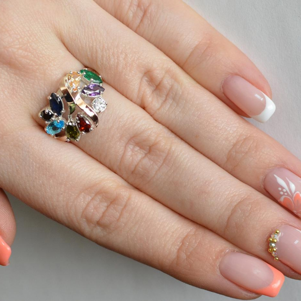 Срібна каблучка з золотими вставками