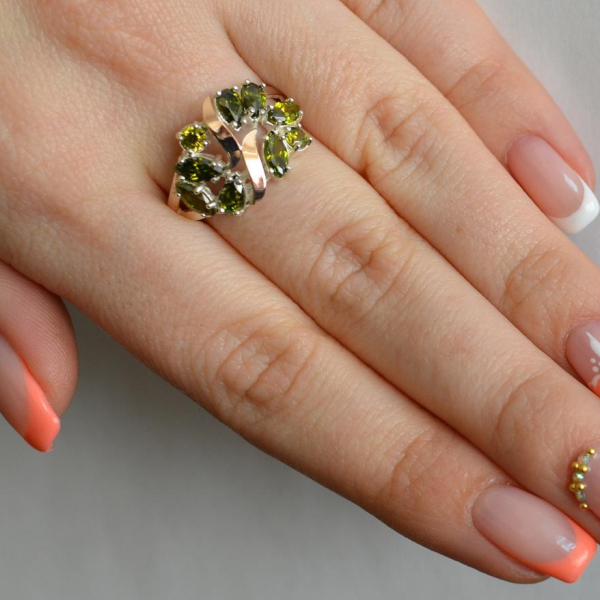 Срібна каблучка з золотими вставками