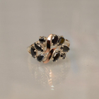 Срібна каблучка з золотими вставками