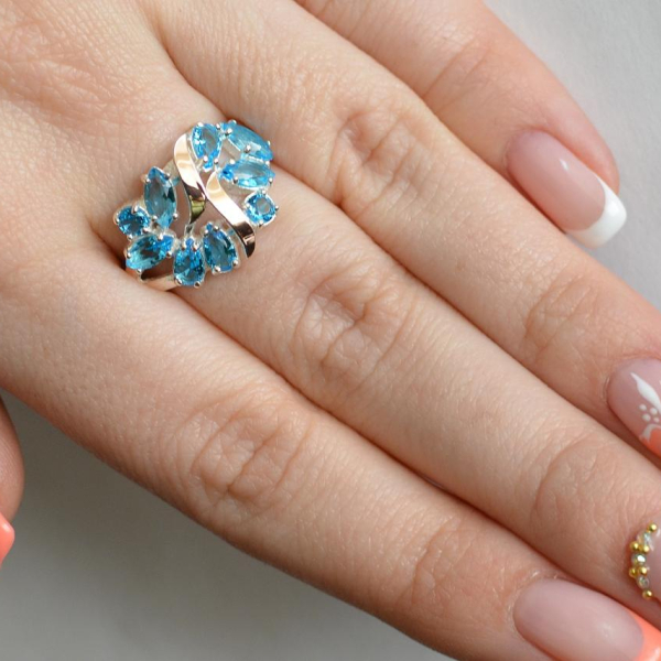 Срібна каблучка з золотими вставками