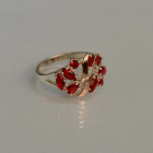 Срібна каблучка з золотими вставками