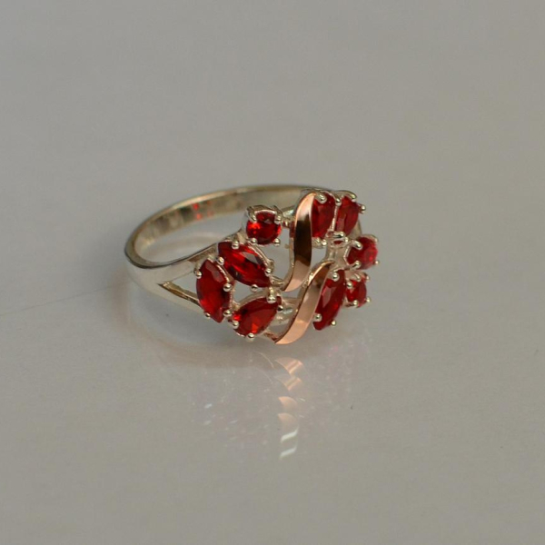 Срібна каблучка з золотими вставками