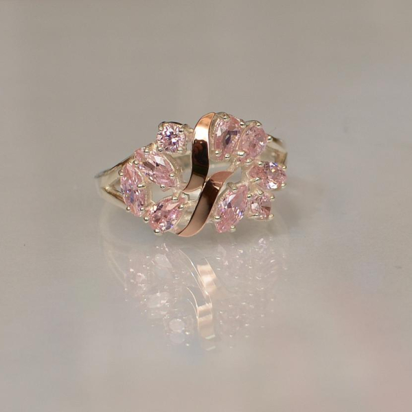 Срібна каблучка з золотими вставками