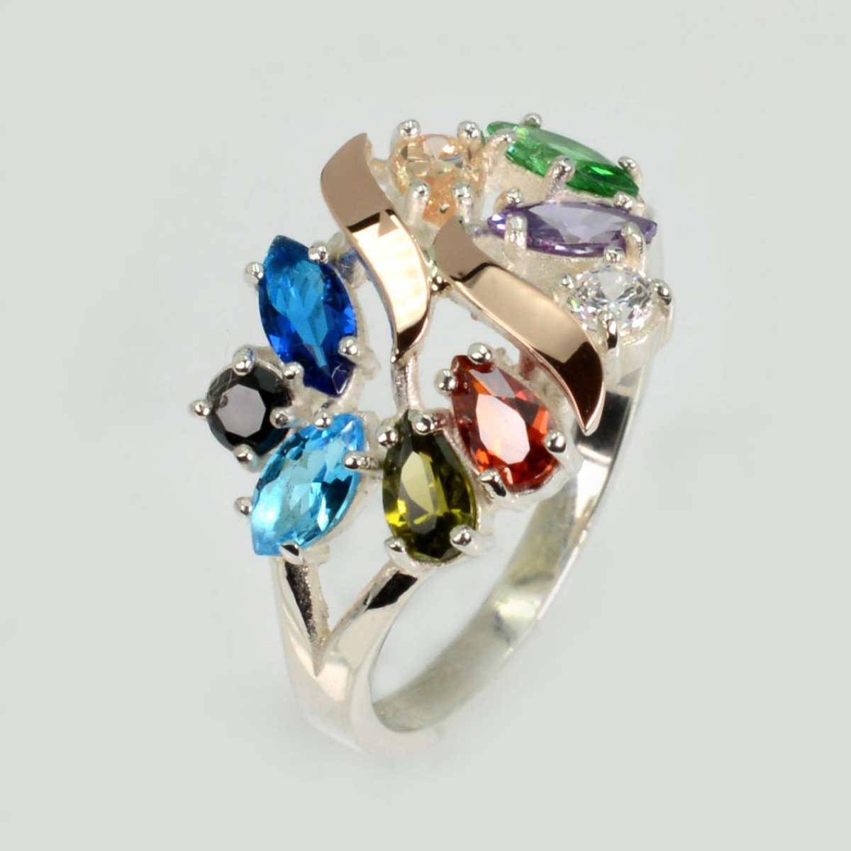 Срібна каблучка з золотими вставками