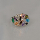 Срібна каблучка з золотими вставками