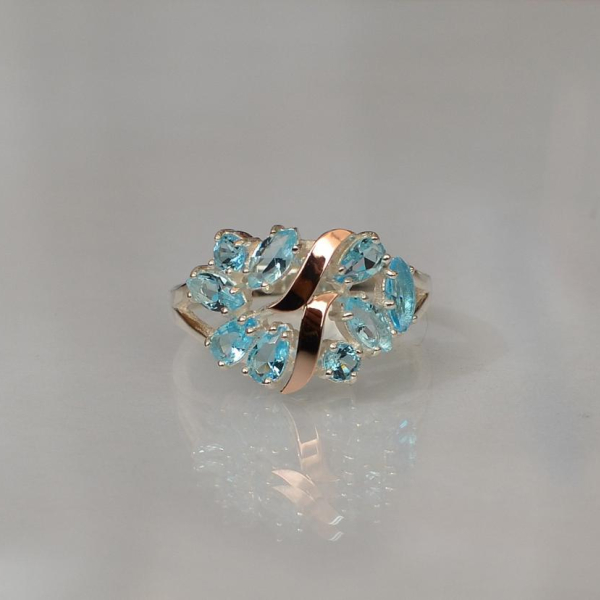 Срібна каблучка з золотими вставками