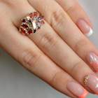 Срібна каблучка з золотими вставками