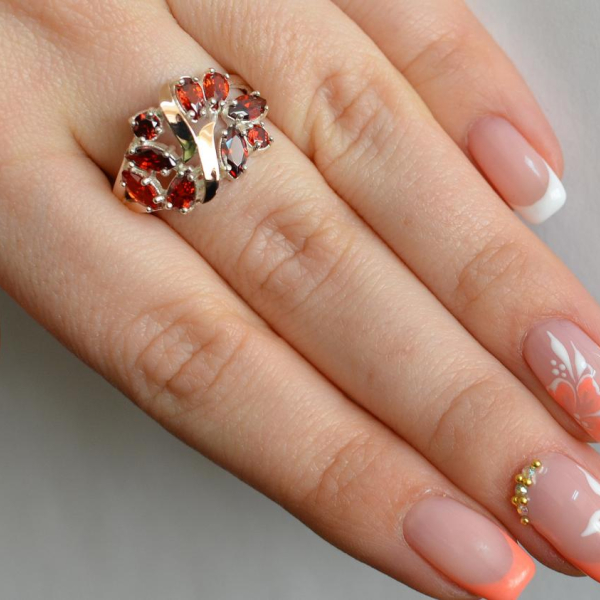 Срібна каблучка з золотими вставками