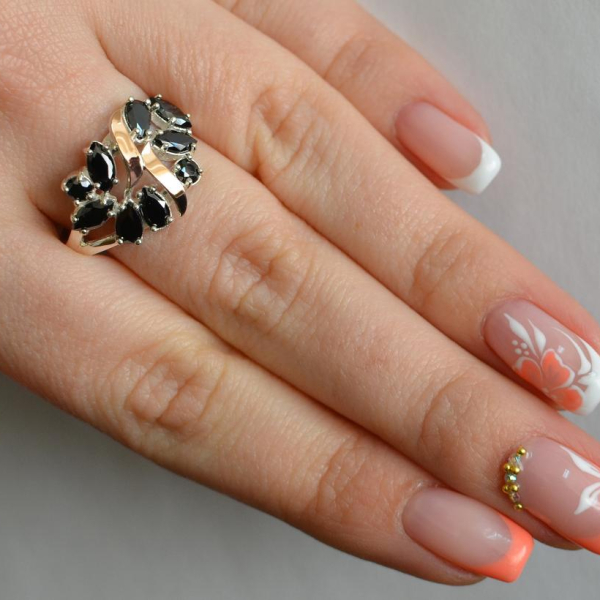 Срібна каблучка з золотими вставками