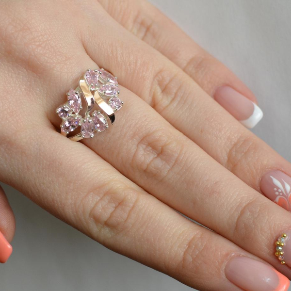 Срібна каблучка з золотими вставками