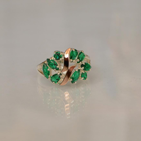 Срібна каблучка з золотими вставками